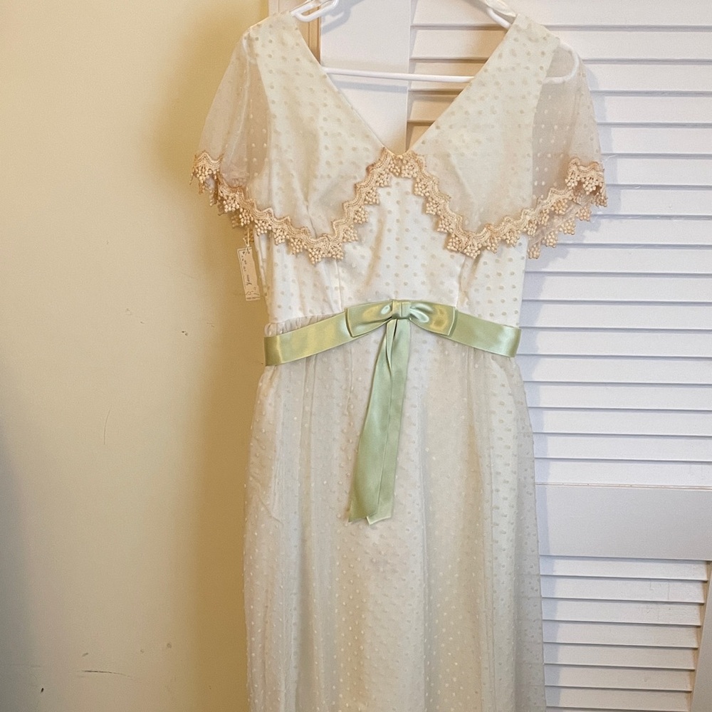 Elegant Cream Dress with Lace and Green Sash—vintage.